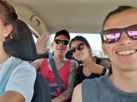 A group of friends or family members are smiling and posing for a selfie inside a car. MJ and Cisco, San Felipe, Mexico, June 30, 2019