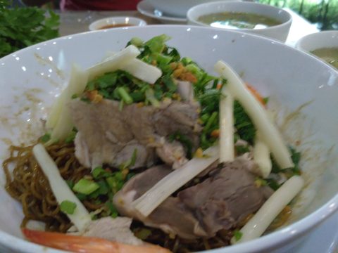 A large white bowl filled with noodles, sliced meat, and fresh green vegetables. Hủ Tiếu Nam Vang Quỳnh, Quan Ba, Vietnam, September 11, 2016